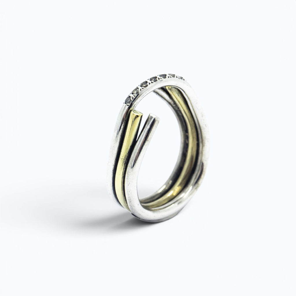 chaotic petite infinity ring in silver and  yellow gold with champagne diamonds, product image vertical view, INNAN Jewellery Berlin