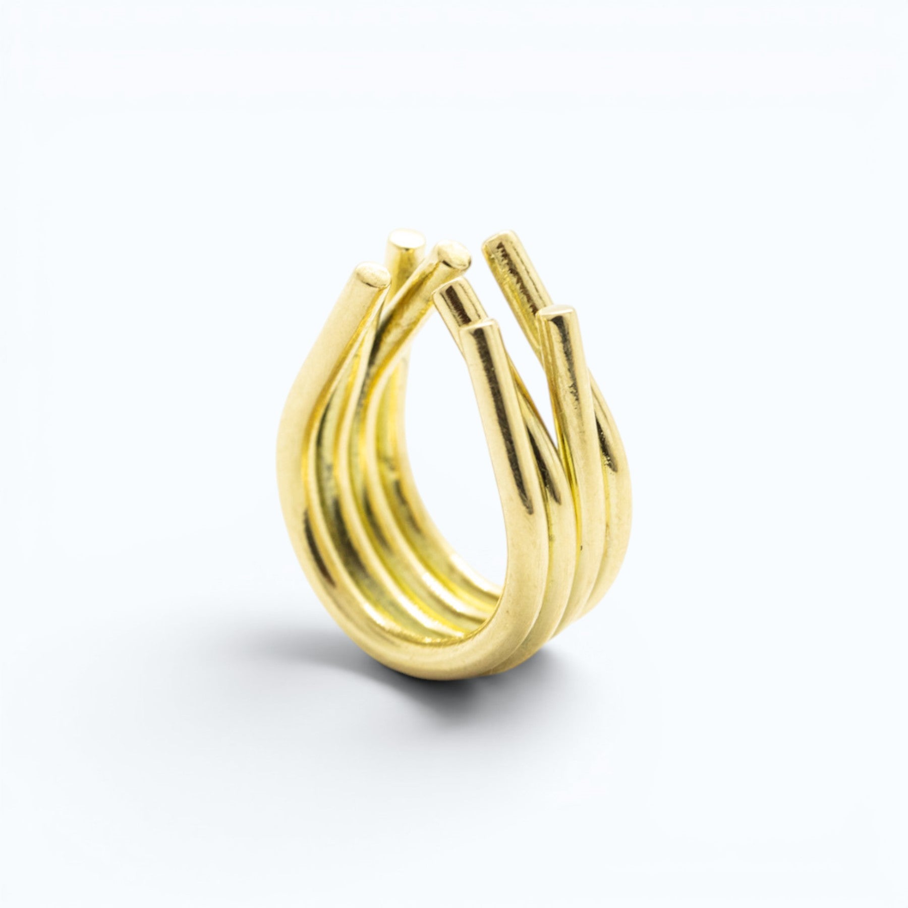 chaotic ring constructed of 4 curves in yellow gold, product image side view, INNAN Jewellery Berlin