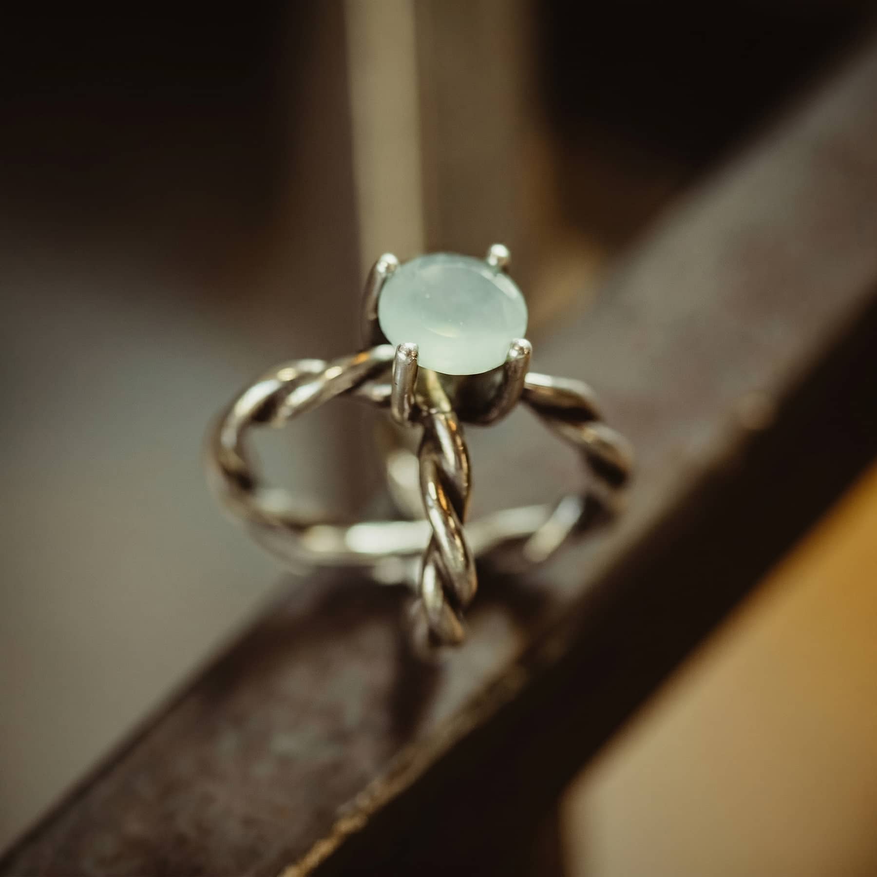 royal celeste universe ring in silver with blue chalcedony, artistic product shot, INNAN Jewellery Berlin