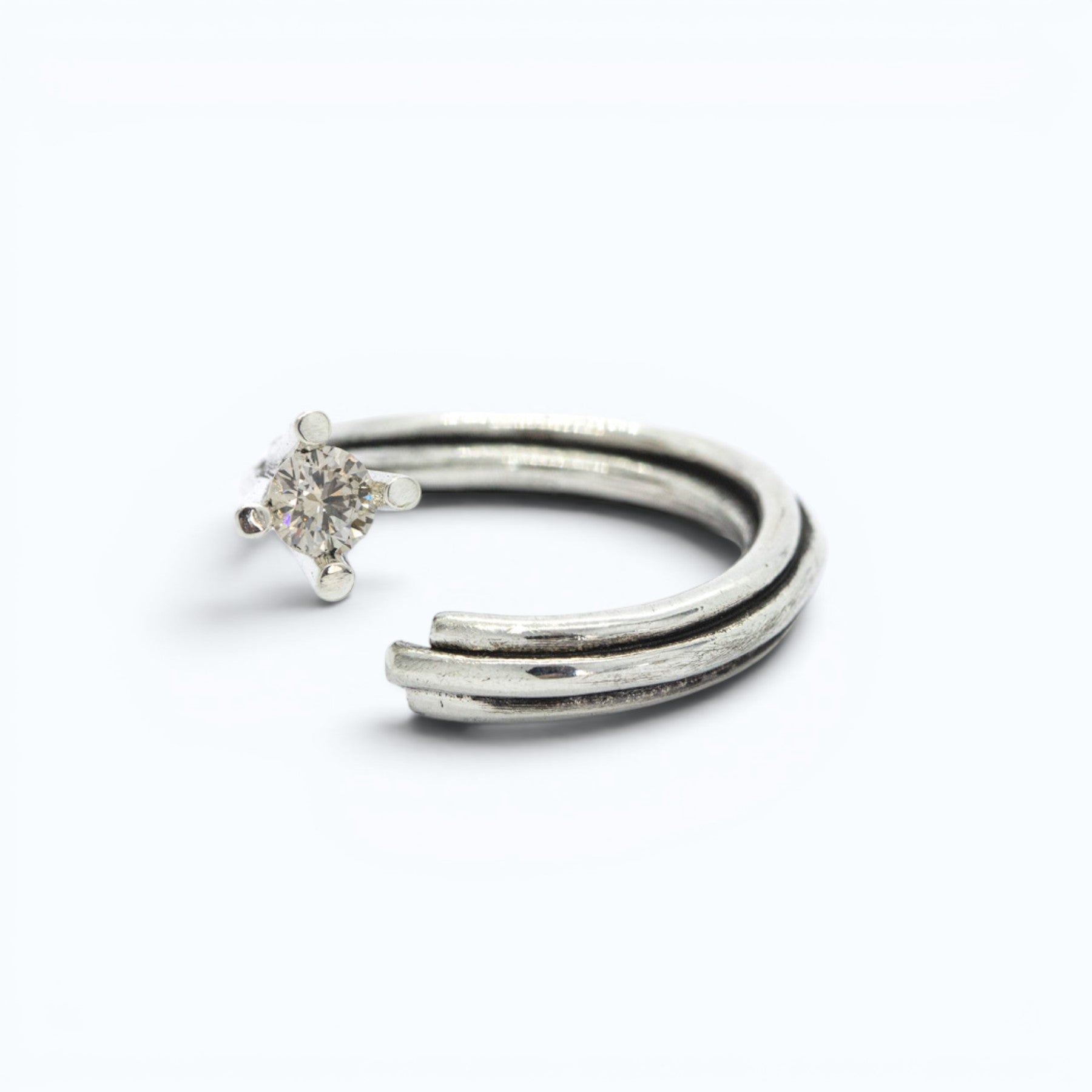 vortex ring in silver with 0.3 ct champagne diamond, product image side view, INNAN Jewellery Berlin