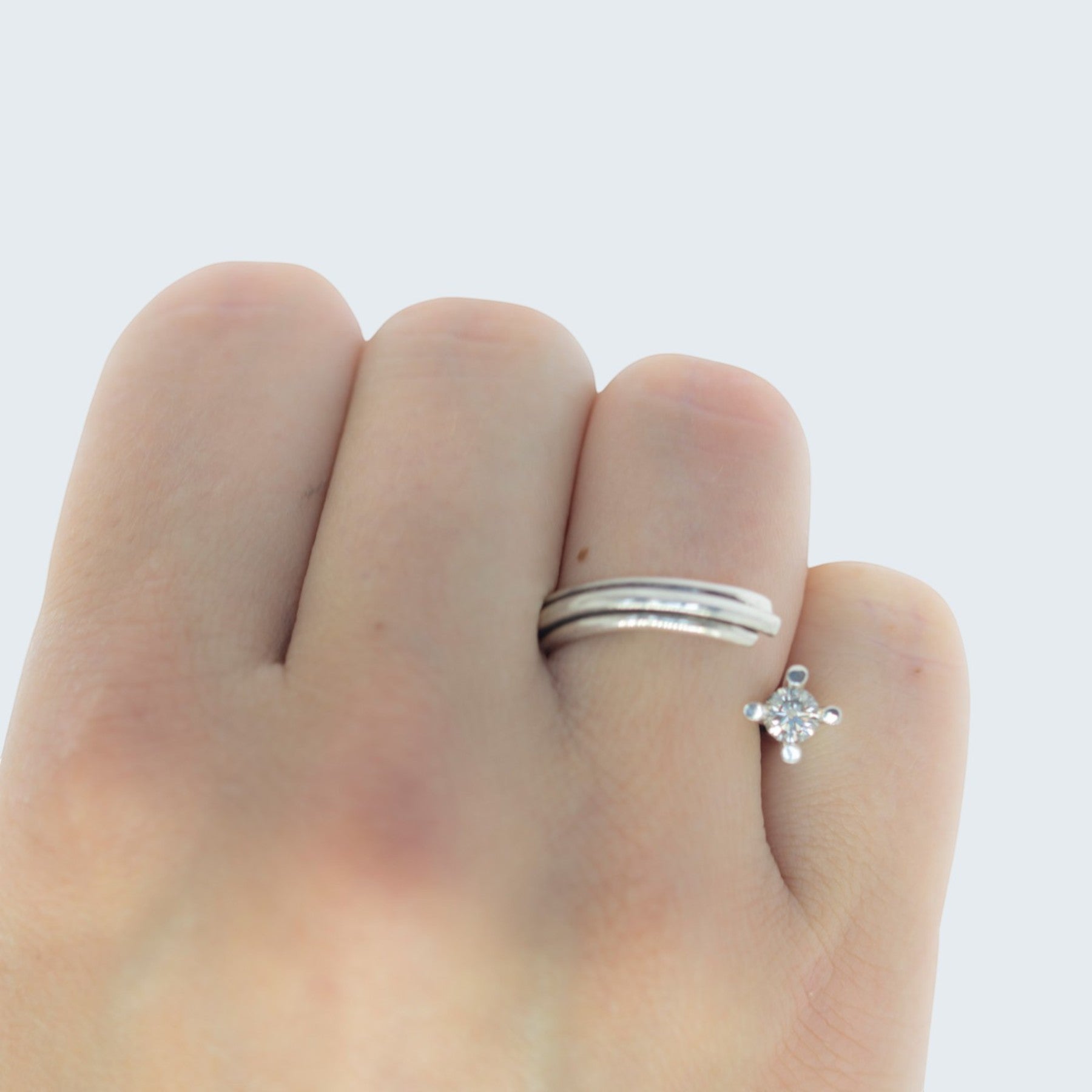 vortex ring in silver with 0.3 ct champagne diamond, product image side view, INNAN Jewellery Berlin