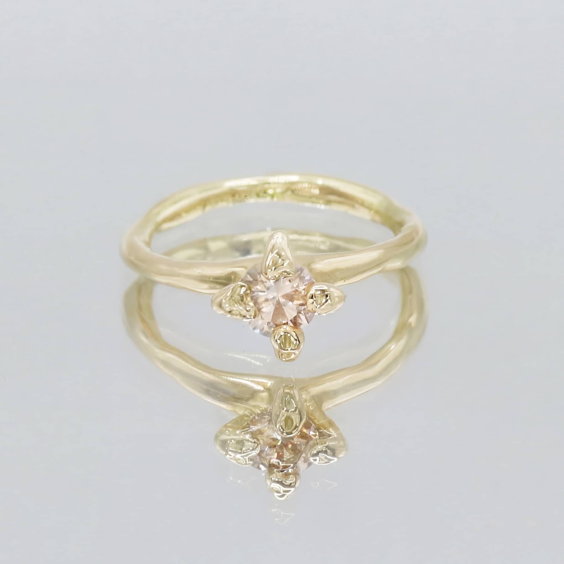 Front view of Anish engagement ring in 18 ct yellow gold with a 0.5 ct champagne diamond by Innan Jewellery