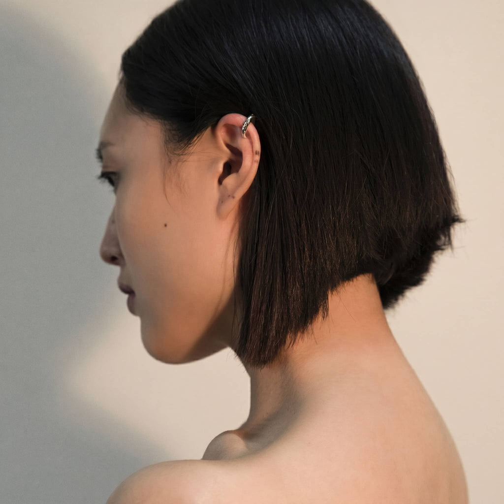 silver cenote mini ear cuff, worn on ear, INNAN Jewellery Berlin