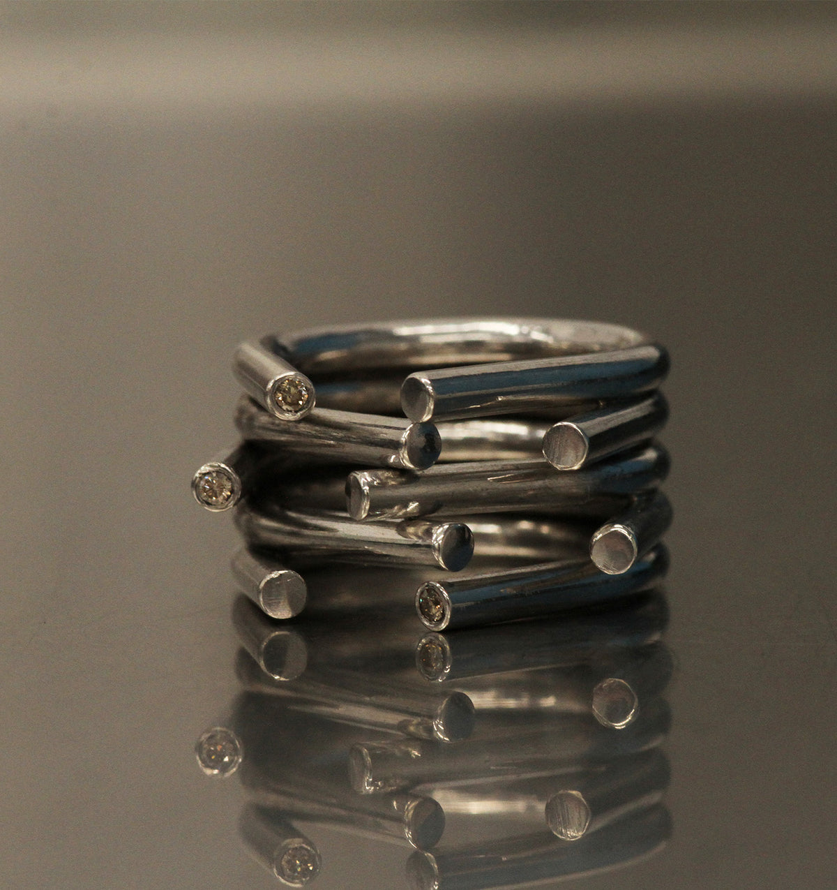 Front view of Chaotic ring in silver with champagne diamonds by Innan Jewellery