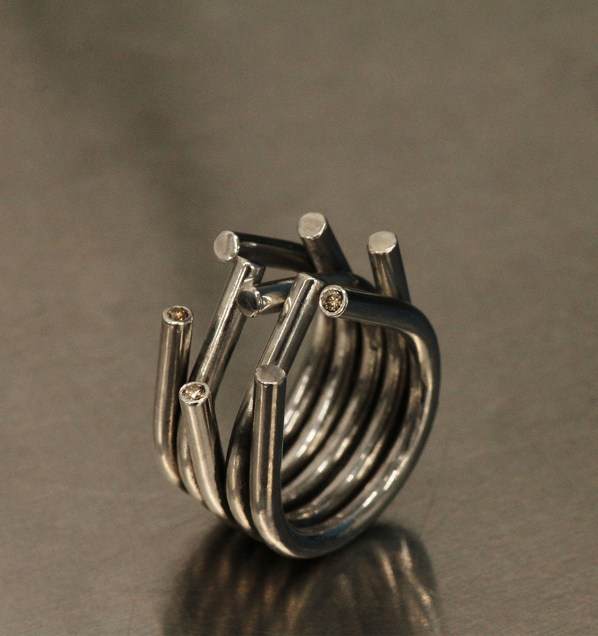 Chaotic ring in silver with champagne diamonds by Innan Jewellery