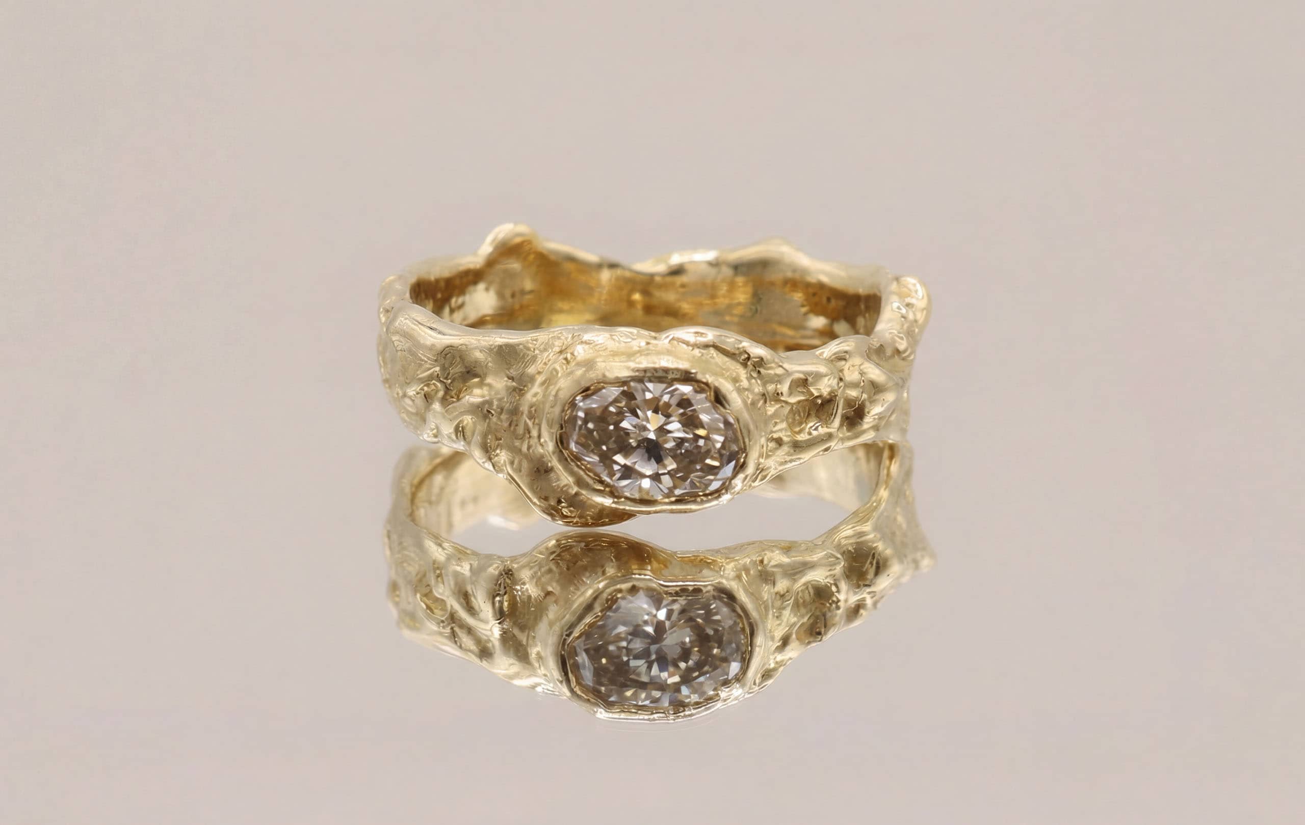 Engagement ring in 18 ct yellow gold with a 0.5 ct champagne diamond by Innan Jewellery