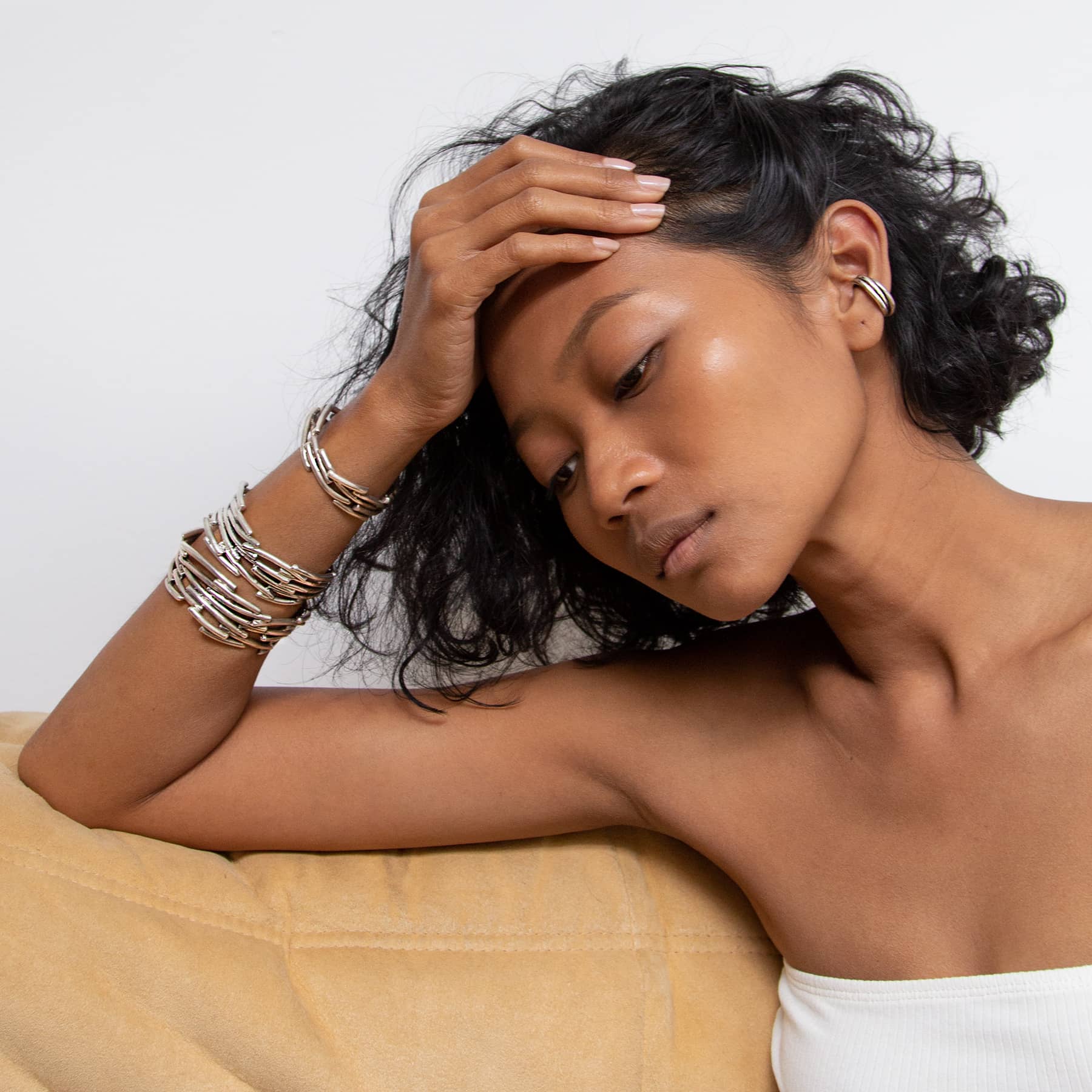 petite flow bracelet in silver, worn combined with flow bracelets, INNAN Jewellery Berlin