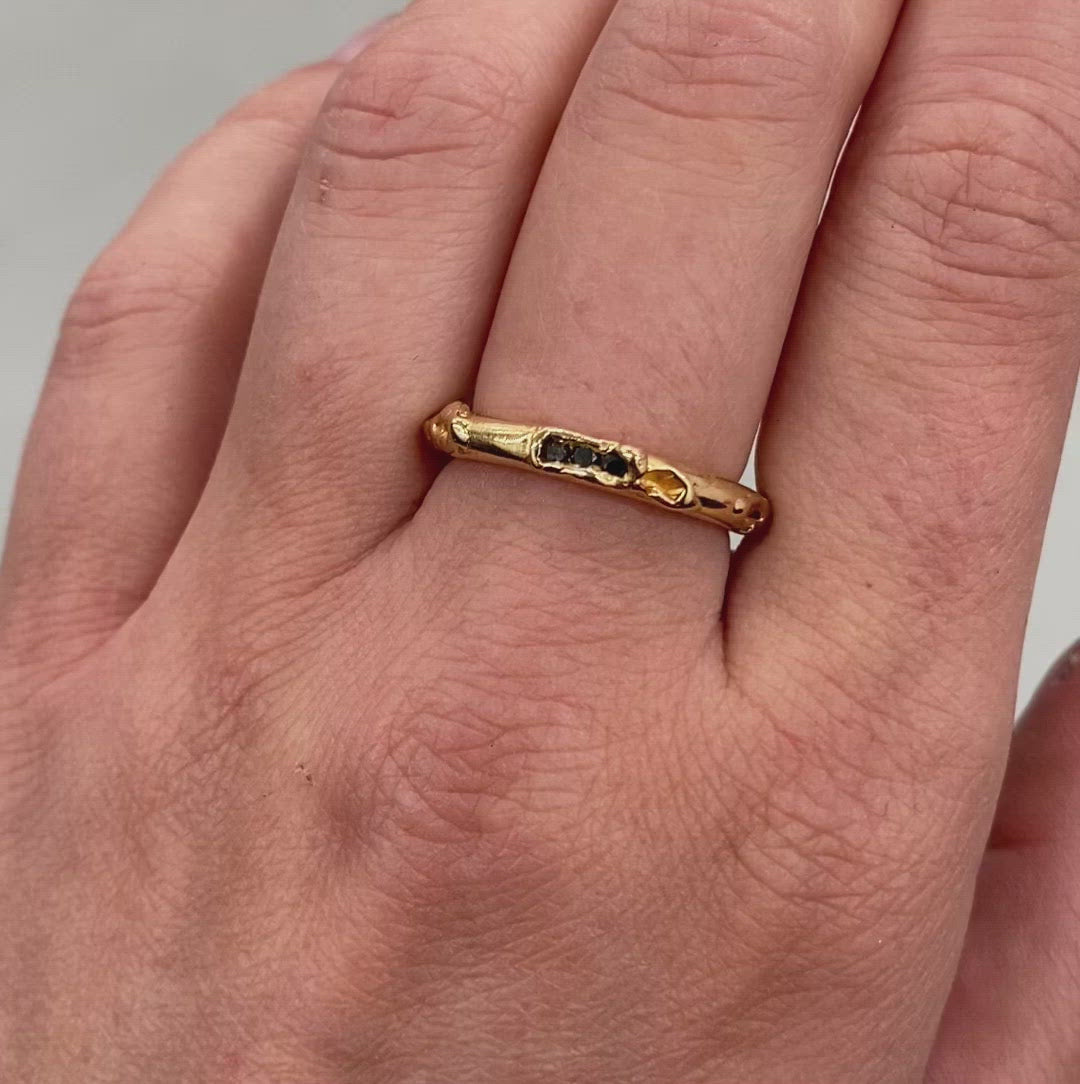 video of the antre golden ring with black diamonds worn on hand