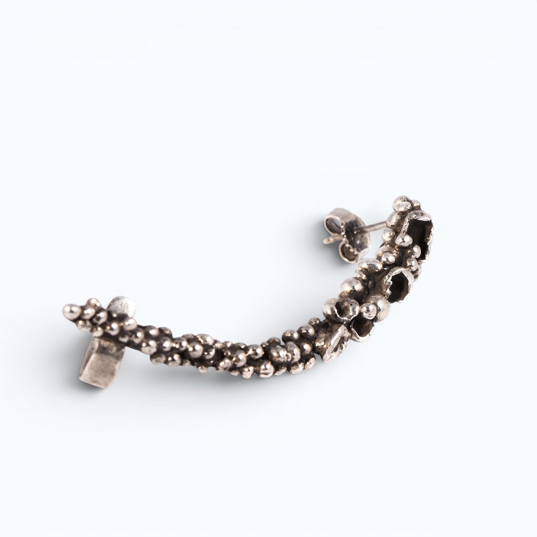 silver stardust ear cuff, worn on ear, INNAN Jewellery Berlin