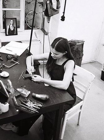 Designer Inna Nechyporenko working at the bench in the atelier at Innan Jewellery Berlin