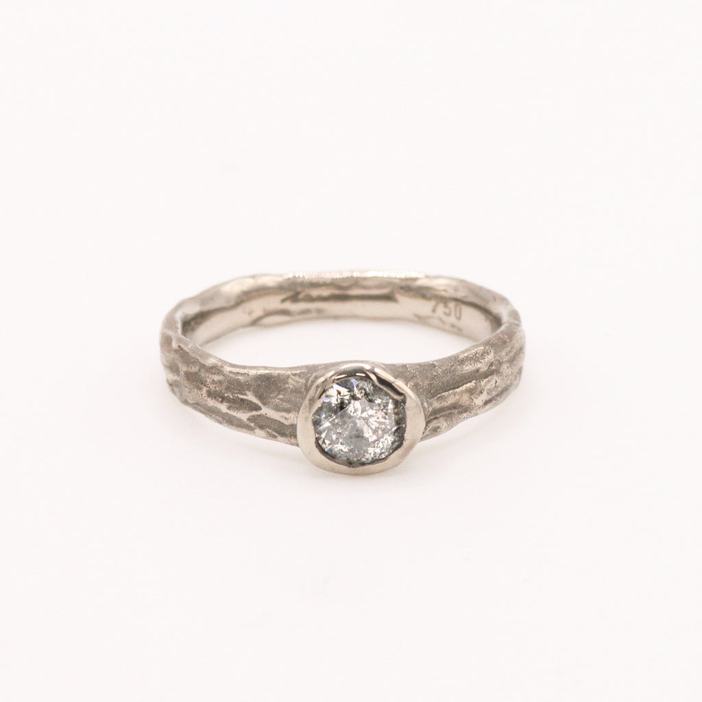 Front view of Verve engagement ring in 18 ct white gold with a 0.52 ct salt and pepper diamond by Innan Jewellery