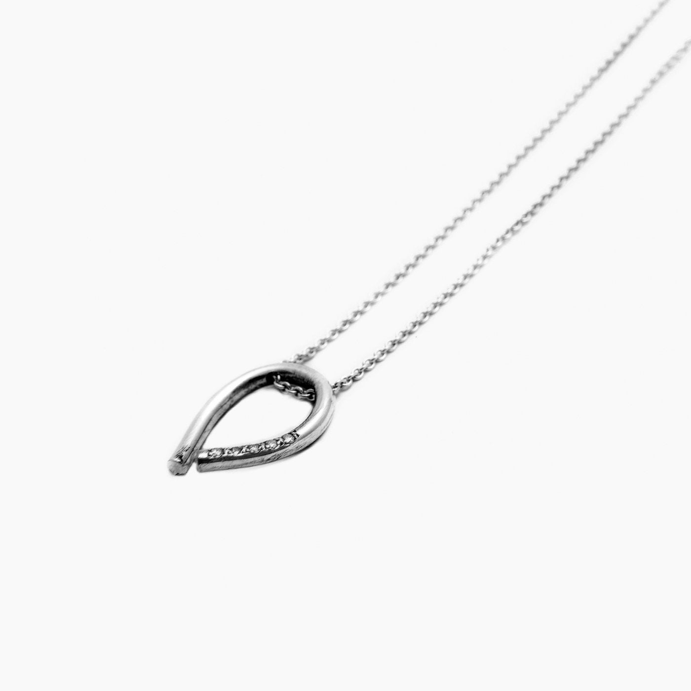 pendant chaotic curve silver champagne diamond product view innan jewellery